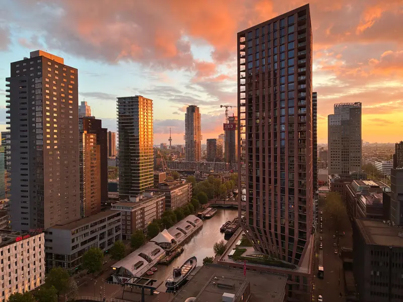 Office buildings seen from the side with the rising sun